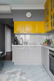 Furniture in the room like a rack cabin looks neat with this formation. 25 Lively And Bold Grey And Yellow Kitchens Shelterness