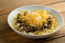 The ones you get from the airport in cincinnati w/the authentic recipe, this is by far the most authentic. Cincinnati Chili Framed Cooks