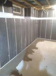 Insulated wall panels are compatible with your basement drainage system and other waterproofing products, and they can tuck easily into the drain below to direct water from the walls to your sump pump. Basement Waterproofing Basement To Beautiful Wall Panels Restore Fall Creek Wi Basement Insulated Wall Panels