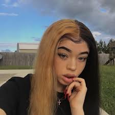 Split Dye Black And Blonde Curly Hair Dork Half Colored Hair Split Dyed Hair Hair Inspo Color