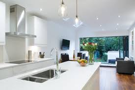 You could go all out like this home bar below and create an actual bar or you could just pop a jazzy bar cart in your alcove a decorate the wall above it with some cool prints and some fairy lights. Manchester Victorian Terraced House Side Extension