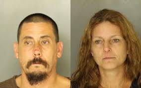 Ephrata couple arrested for firearms violations after raid