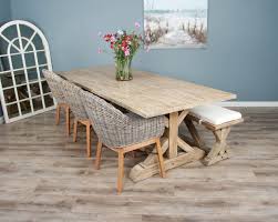 Charming country dining table with contemporary twist. 2 4m Reclaimed Pine Cross Dining Table With 3 Scandi Armchairs And 1 Dining Bench Sustainable Furniture