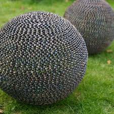 These Spheres Have An Industrial Modern Feeling That Provides A Striking Contrast To Its Surroundi Garden Spheres Contemporary Garden Unusual Garden Ornaments