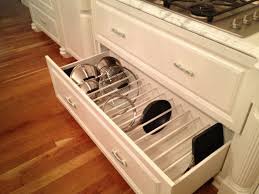 In this article, we discuss three great options to keep your cookware tidy and free up some space. Pot Lid Organizers Kitchen Organizing Ideas