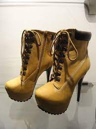 The features include a nubuck faux leather upper with a pointed closed toe, cut out scoop vamp, stitched trim, strappy design with buckle accents, lace up tie design, inner side zipper closure, smooth lining, and cushioned footbed. Pin On Stuff To Buy