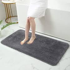 Bath mats are designed to absorb the water from a shower or bath after you step out. 17x24 Beige Thick Plush Shaggy Soft And Absorbent Buganda Microfiber Bathroom Rugs Non Slip Machine Washable Bath Mat And Bath Rugs For Bathroom Home Kitchen Bath Alpharise Co Jp