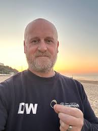 Hiya. We've lost my son's phone. It's a light green iPhone 12 mini. It has  an f16 sticker