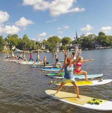 sup yoga with downtown annapolis in the