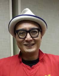 He was born in Singapore in 1941 and was a renowned columnist and food  critic. He moved to Hong Kong in 1963 and went