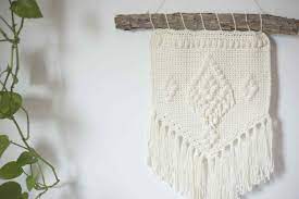 Living room decor with wall clock hz. Crochet Wall Hanging Patterns To Try Today