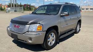 Image result for Medium Red 2003 Envoy