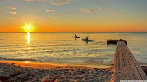 Maybe you would like to learn more about one of these? Hd Wallpaper Sea Kayaking To The Sun Golden Hour Beach Kayaks Dock Sunset Wallpaper Flare