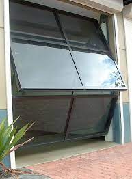 folded garagedoor good for small garages and gives a marvelous look folding garage doors garage door design garage doors