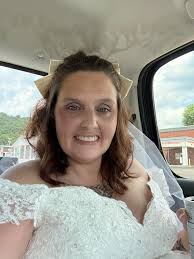 Can somebody remove the background from a wedding photo and add a beautiful  scene?