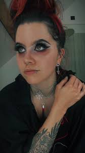 Explore the Alluring Vampiress Emma's Flirtatious Side