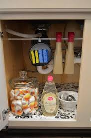 easy under the kitchen sink organizing