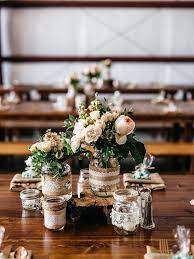 34 Rustic Wedding Centerpieces To Make Your Reception Tablescape Shine Wedding Centerpieces Diy Mason Jars Rustic Wedding Centerpieces Flower Centerpieces Wedding
