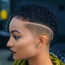 In this cut, the sides and back are a complete fade, and the top has short permed hair. Pin On Short Hairstyles For Black Women 2019 Edition