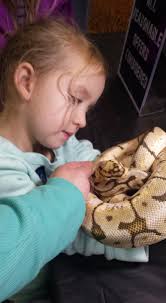 Just wanted to show off my 1 year old who LOVES snakes lol.