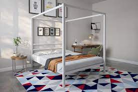 The modern canopy bed is available in twin, full, queen and king sizes in various colors. Dhp Modern Canopy Bed With Built In Headboard Queen Size White Buy Online At Best Price In Uae Amazon Ae
