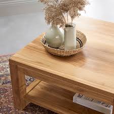 A custom made rustic coffee table is often called the anchor of the living room.the classic low table can pull a space together and set the tone that incorporates all the other furniture elements. Tikamoon Eve Solid Teak Square Coffee Table
