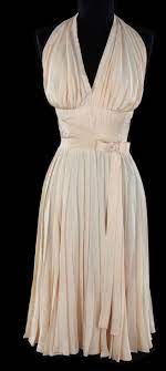 Marilyn monroe's white subway dress by william travilla (an american costume designer for theatre, film, and television), the most recognized costume in film history, from the seven year itch movie, has sold for $5.6 million at an auction in los angeles. Marilyn Monroe Ivory Subway Dress From Seven Year Itch