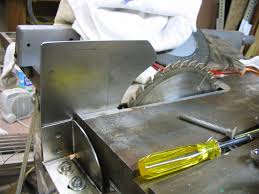 The instruction manual describes how to install the shims. Tablesaw Blade Guard Bolis Com