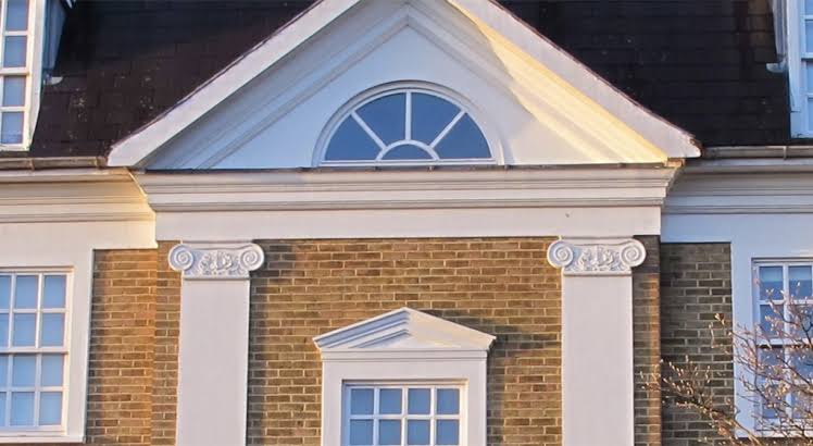 Structural engineer inspecting wall cracks for mortgage lender report