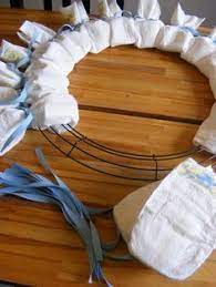 A Baby Shower Diaper Wreath Baby Shower Diy Baby Shower Wreath Baby Shower Diapers
