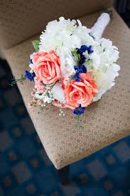 There is something about blue that gives it a universal appeal. Cobalt Blue And Coral Virginia Wedding Rebecca Robert Coral Wedding Bridesmaid Bouquet Wedding Colors