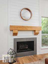 shiplap fireplace feature with 8x8 cypress wood mantle and florida tile aventis 12x24 tile surround in ask color fireplace tile home fireplace wood mantle