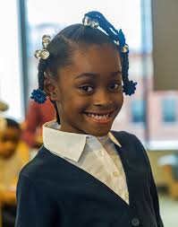 OUR COMMUNITY RISING