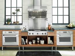a cooktop and wall oven in the kitchen