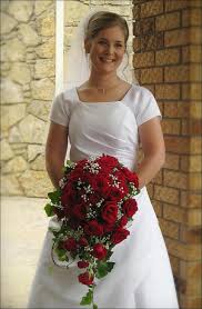Early tradition used white roses as a symbol for true love, an association which would later become the hallmark of the red rose. Red Rose Wedding Bouquets 20 Ravishing Reds To Choose From
