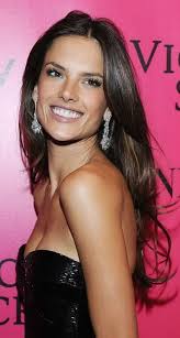 Iridescent golden highlights lift and add life to Alessandra Ambrosio base  color. Her long layered locks appear more shiny and dimensional with golden  highlights streaked through the lengths.