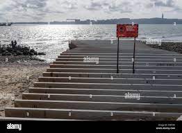 Unfinished concrete slipway on the waterfront promenade on Av Ribeira Das  Naus in Lisbon,Portugal Stock Photo - Alamy