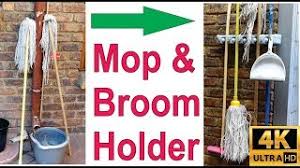 The magic holder's usefulness expands well beyond the broom closet too. How To Install A Broom And Mop Holder Youtube