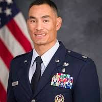 Col. Erin Miller addresses the audience for the first