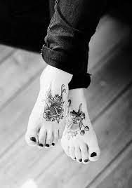 A bird design on each foot, each in a similar style to match but still slightly different. 75 Cool Foot And Flip Flop Tattoos