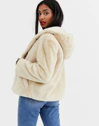 Fake unfunctional chest pocket design. Stradivarius Faux Fur Jacket With Hood In Camel Asos