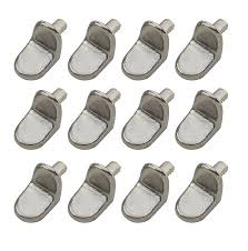 Your new cabinet shelves will be held in place with angle shelf supports that fit inside these shelf pinholes. Metal Shelf Support L 22 5mm Pack Of 12 Diy At B Q