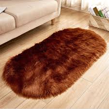 What is the price range for blue area rugs? Factory Direct 90 180cm Australian Imitation Wool Rug Oval Plush Rug Living Room Bedroom Bedside Blanket Bay Window Pad Custom From Dezhouchangjin 56 76 Dhgate Com