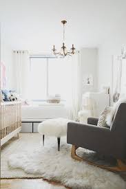 She has chosen one unifying color—black—to bring some cohesion. Layering Rugs Like A Boss Studio L Interior Design