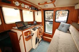 Pilot house view looking forward. Nordic Tugs 32 1999 In Sayward Bc Offered By Grand Yachts