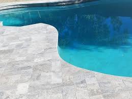 The mounted cap, visible at the edge of swimming pools are pool coping. Gray Travertine Pavers Novocom Top