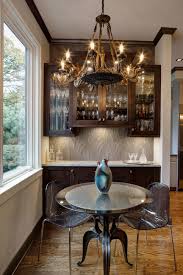 Informal dining room long view (49/53). Informal Dining Area With Crystal Stemware Displayed Hgtv