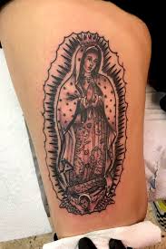 Few details are needed other than a simple garment. Tattoo Uploaded By Davey Graham Black And Grey Traditional Virgin Mary Tattoo On A Thigh 932340 Tattoodo