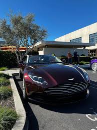 Image result for Divine Red 2021 Aston Martin
