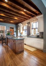 Exposed trusses exposed ceilings roof trusses roof ceiling open ceiling slanted ceiling ceiling fan porch roof design roof truss design. Past Perfect Utah Style Design Exposed Joists Exposed Joist Ceiling Kitchen Home Decor Kitchen